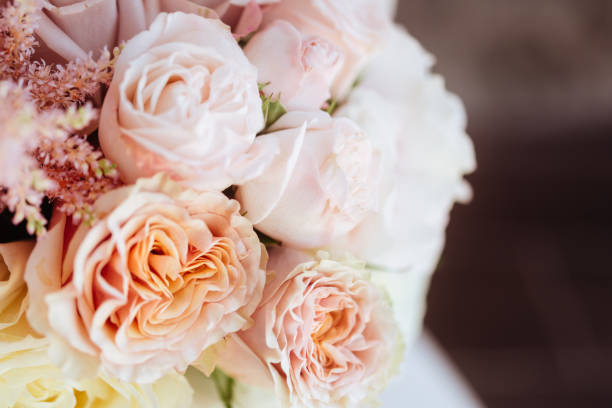 istock Wedding flowers, bridal bouquet closeup. 1165204289