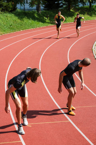 istock Track relay race - waiting for the baton 1165204554