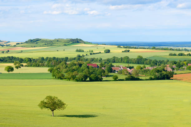 The countryside and a French village in the middle of the fields stock photo