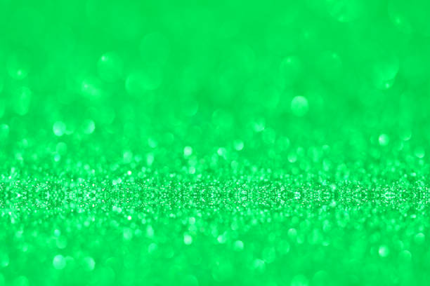 istock green glitter texture christmas abstract background, Defocused abstract green glitter texture background 1165212536