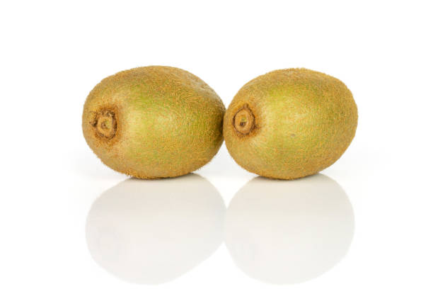 istock Fresh green kiwi isolated on white 1165212559