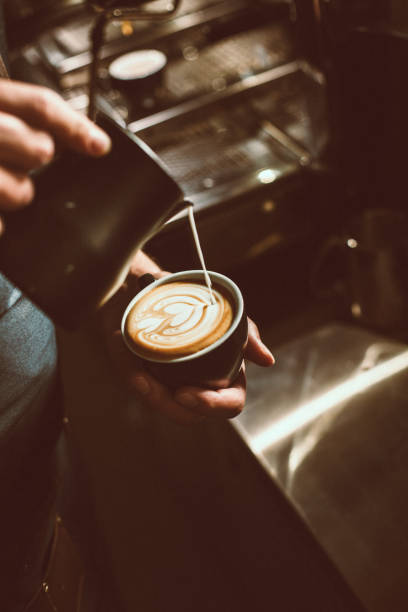 istock Pouring milk to create latte art 1165214318