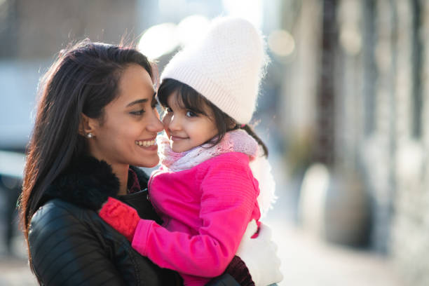 istock Smiling Muslim mother and child 1165214613