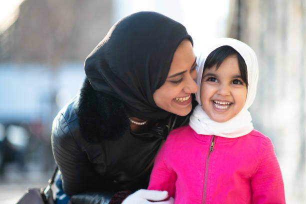 istock Smiling Muslim mother and child 1165214616
