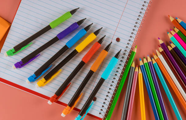 istock School supplies with a notebooks and colors pencils 1165220359