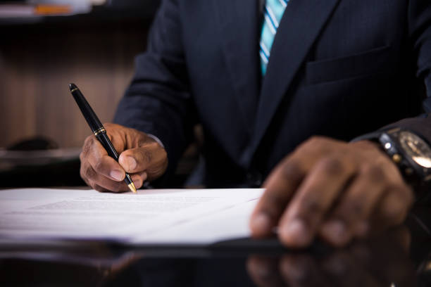 istock Black business man signature 1165222071