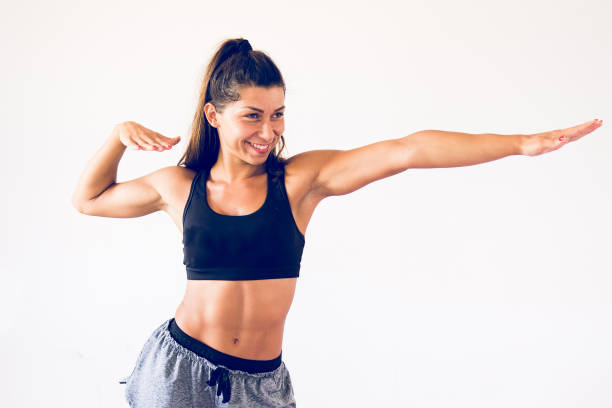 istock Young woman in the pose athletic portrait 1165223028