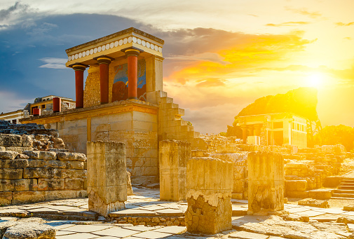 Ruins of Knossos palace under sunbeams. Major city of ancient Crete island. Centre of Minoan civilization and culture. Famous archaeological attraction. Greece