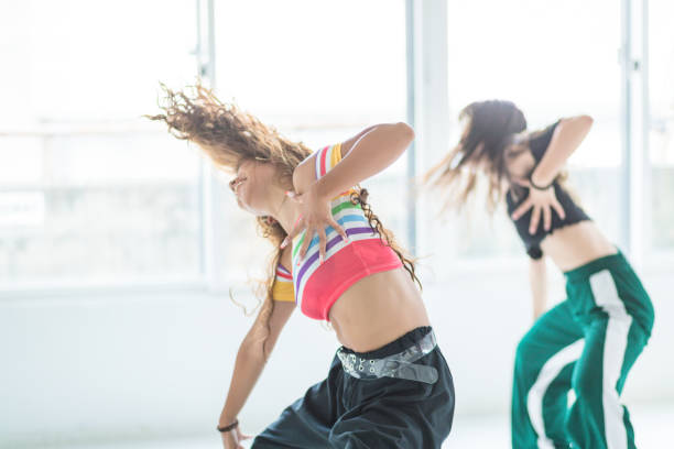istock Young female dancers dance in studio 1165231247