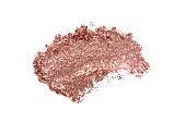 Glitter eye shadow or body smear isolated on white.