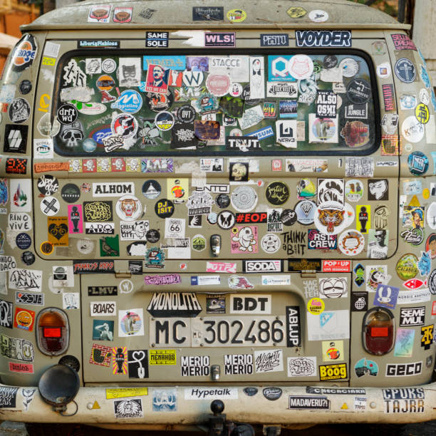 Back Side of a Hippie Mini Van, Trastevere, Rome, Italy Back Side of a Hippie Mini Van covered with stickers in Trastevere, Rome, Italy. Colorful Trastevere is a funky, bohemian area in Rome. labeling photos stock pictures, royalty-free photos & images