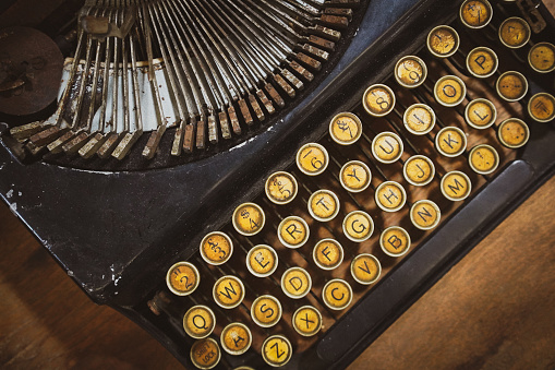 Details of an old retro, Antique Typewriter. Vintage style, dusty surfaces, Close up Photo