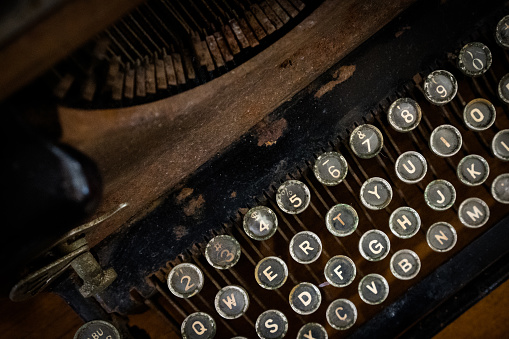 Details of an old retro, Antique Typewriter. Vintage style, dusty surfaces, Close up Photo