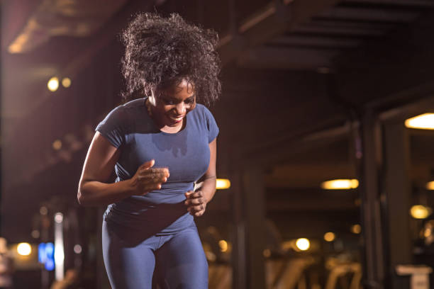 istock Beautiful Middle Aged Black Female Athlete working out in Gym Setting 1165246309