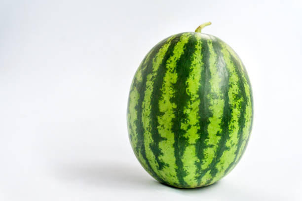 istock Green watermelon balls on a white background. 1165247427