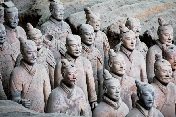 World famous Terracotta Army located in Xian China The world famous Terracotta Army, part of the Mausoleum of the First Qin Emperor and a UNESCO World Heritage Site located in Xian China qin dynasty stock pictures, royalty-free photos & images