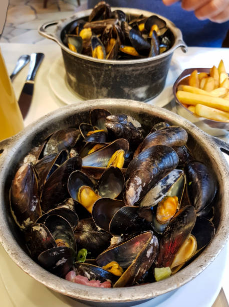 istock Mussels in iron cups national traditional Belgian dish 1165249524