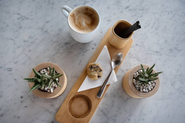 istock Cup of coffee with sugar, cookie, top view. Coffee arrangment in cafe 1165250165