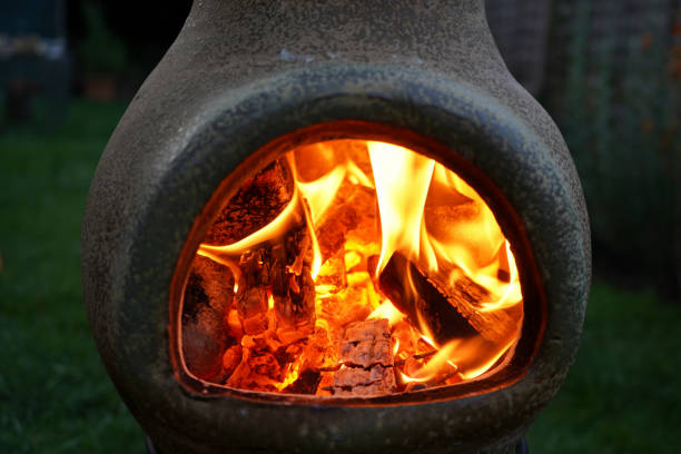 istock Close up of a Chimenea on fire in a garden 1165251111