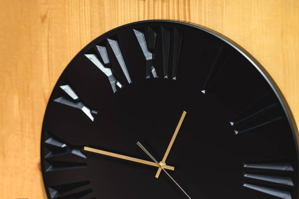 istock Black watch with Roman numerals 1165251303