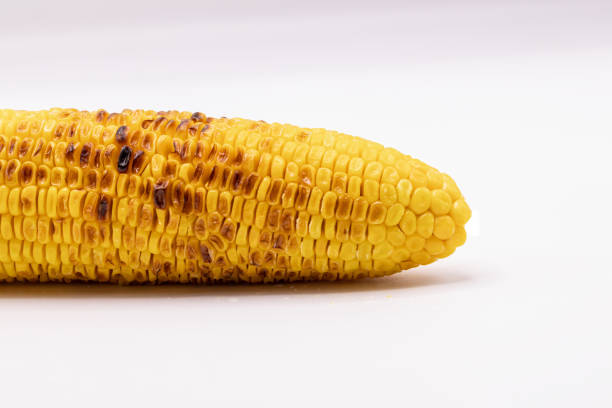 istock Close up grilled sweet corn with butter isolate on white background. 1165252480