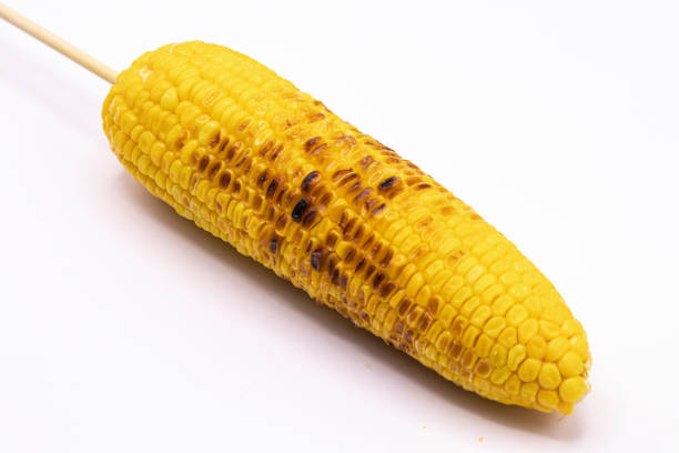 istock Close up grilled sweet corn with butter isolate on white background. 1165252649