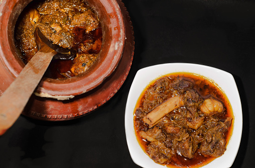 It's a signature dish of old Champaran, Bihar, India. The specialty of this dish is that it is prepared in an earthen pot called HANDI and is cooked for hours over charcoal.