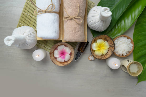 istock Composition of spa treatment on wooden table 1165256834