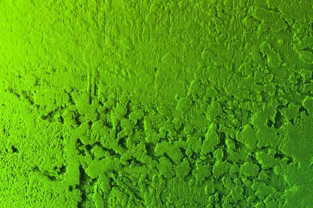 istock green shining style highlighted layered surface texture - wonderful abstract photo background 1165259553