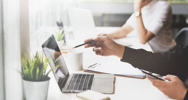 istock Side view of smart business team preparing their project 1165260582
