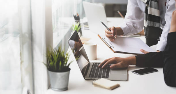 istock Professional business people brainstorming their idea 1165260635