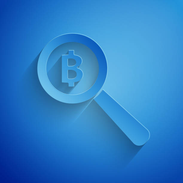 istock Paper cut Magnifying glass with Bitcoin icon isolated on blue background. Physical bit coin. Blockchain based secure crypto currency. Paper art style. Vector Illustration 1165261785