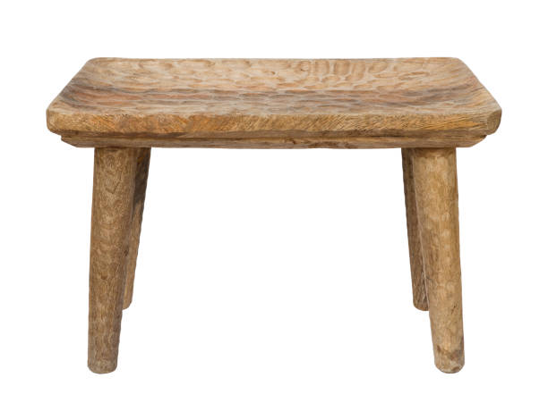istock Vintage wooden four legs stool isolated on white background 1165264691