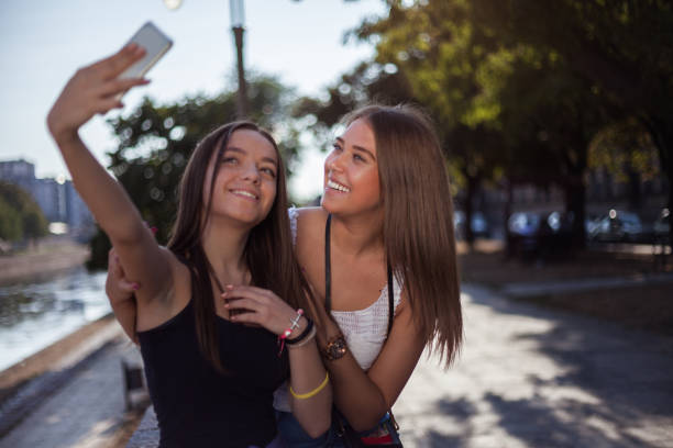 istock Best friends taking selfie together 1165272640