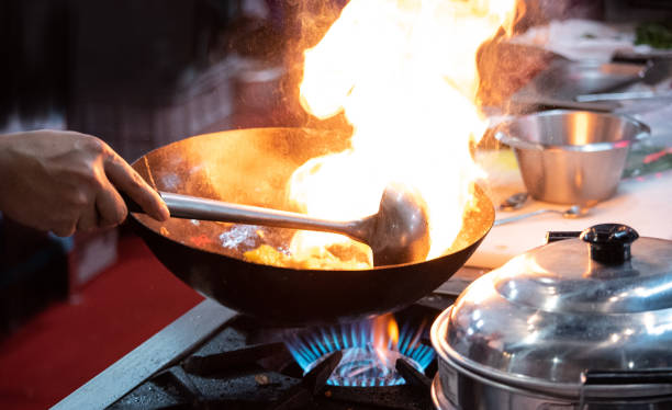 istock Chef preparing food, meal, in the kitchen, chef cooking, Chef decorating dish 1165275784
