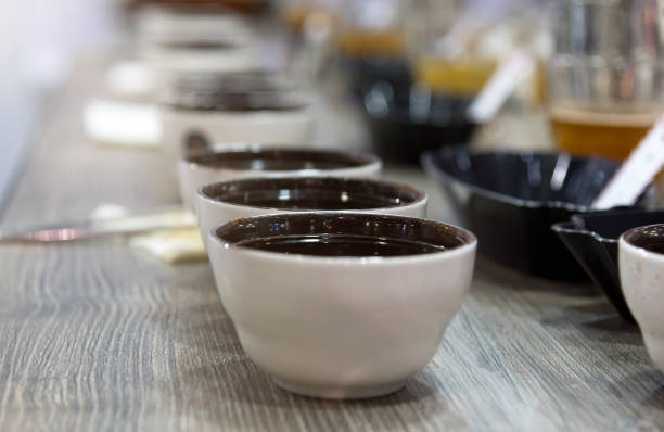 istock Tasting coffee in glass, Coffee cups on table for tasting 1165275786