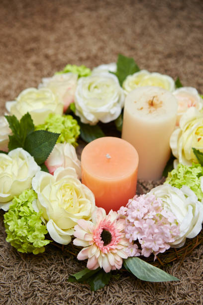 istock Flower wreath with candle 1165276171