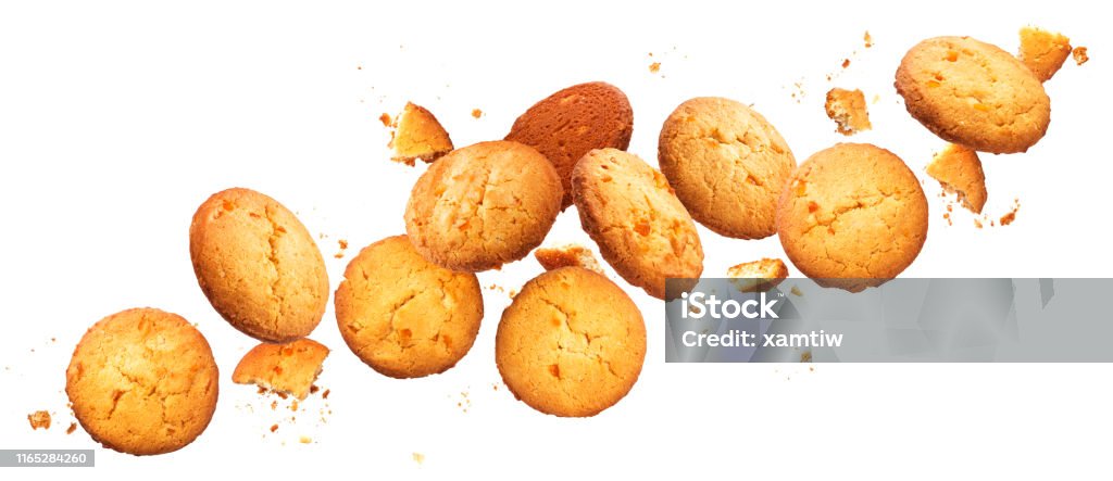 Falling broken chip cookies isolated on white background with clipping path Falling broken chip cookies isolated on white background with clipping path, flying biscuits collection Cookie Stock Photo