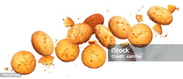 Falling Broken Chip Cookies Isolated On White Background With Clipping Path Stock Photo - Download Image Now