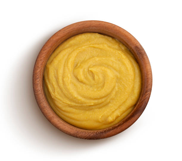istock Mustard sauce isolated on white background, top view 1165285046