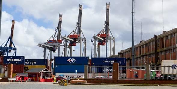 URUGUAY - SEPTEMBER 25: Containers and cranes in Port on September 25, 2012 in Montevideo, Uruguay. It is one of the largest ports of South America and an important transit area for loads of Mercosur