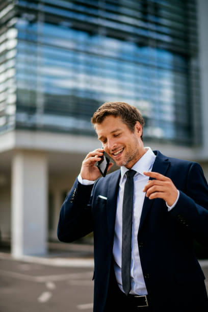istock Business man using his cell phone 1165289013