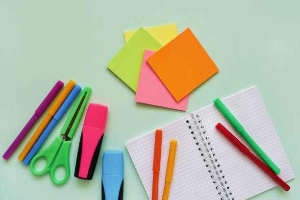istock School subjects on green background. Back to school concept. Flat lay, copy space 1165291285