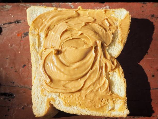 Breakfast of slice toast bread with peanut butter