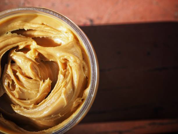 istock Breakfast of slice toast bread with peanut butter 1165291900