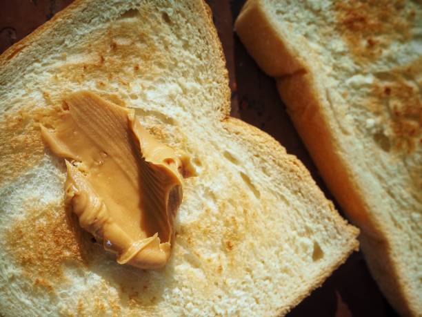 Breakfast of slice toast bread with peanut butter
