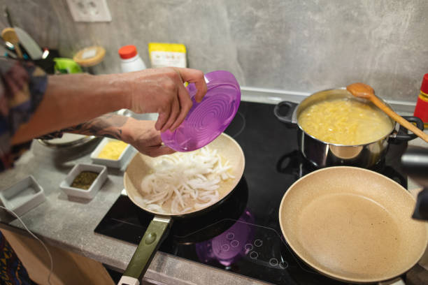 istock Man preparing pasta at home on a stove 1165294199