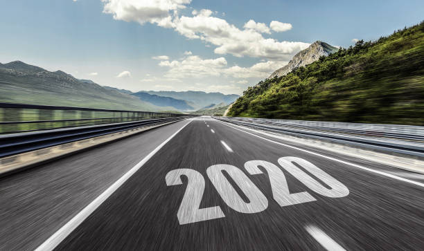 istock Empty asphalt road and New year 2020. Two thousand and twenty. 1165297580