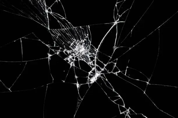 Photo of Broken glass texture. Abstract of cracked screen Smartphone from shock.