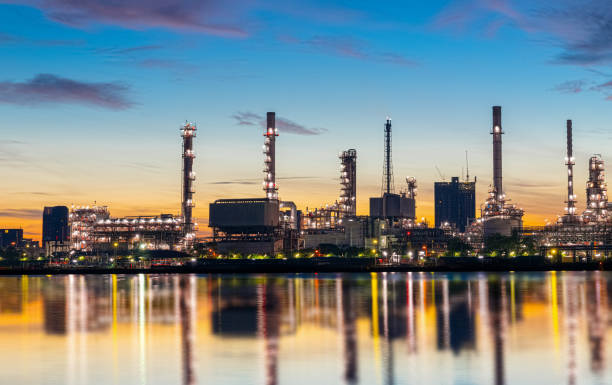 oil and gas refinery industry plant with glitter lighting and sunrise in the morning, factory of petroleum industrial, power plant,energy power station area. industry 4.0 - boiler power station fuel and power generation gas boiler imagens e fotografias de stock